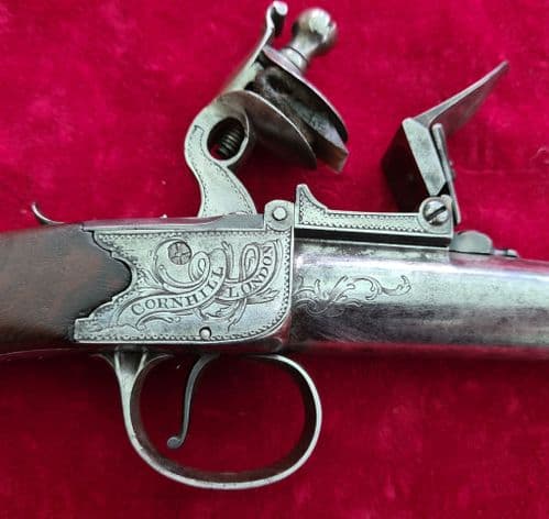 A fine English Queen Anne cannon barrel silver mounted flintlock pistol by Heylin . C.1780. Ref 3229