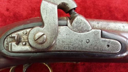 A mid Victorian period British military percussion Coastguard pistol. Lock Marked with a Crown over V.R. Ref 9222.