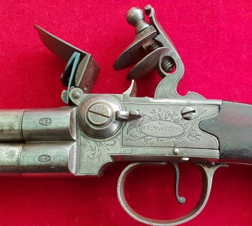 A rare  Four Barrelled Tap Action Flintlock Pistol by W. Henshaw, London. Ref 8605.