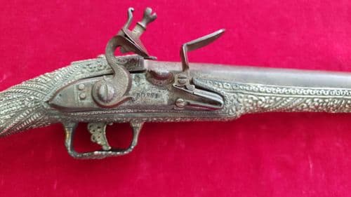 A rare Greek flintlock pistol for sale, with superb silver decoration. C. 1830. Ref 2920