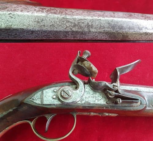A Rare Irish flintlock pistol with TUTANAG mounts,  by Dory of Mallow. Ref 1409.