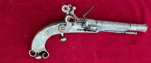 A rare Scottish Ram's horn Highlander's metal flintlock pistol. Engraved MARSHALL EDINr. Ref 3421..