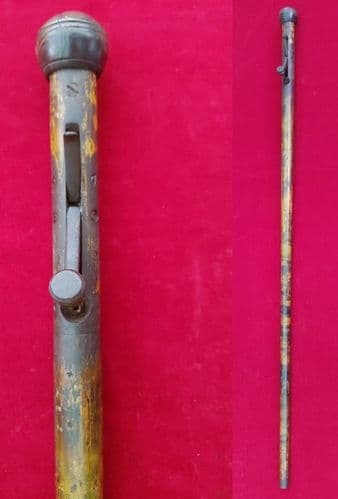 A rare under hammer approx .60 calibre percussion Walking stick gun. Circa 1830. Well used.Ref 1416.
