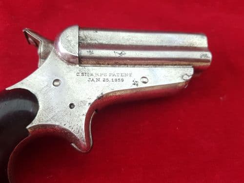 A scarce American antique 4 barrelled Sharps .32 rimfire Derringer. Circa 1859. Ref 1345.