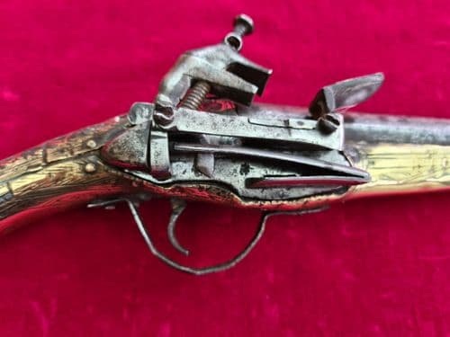 A Scarce Balkan or Turkish Miquelet lock rat-tail pistol covered in brass. Circa 1800. Ref 7287