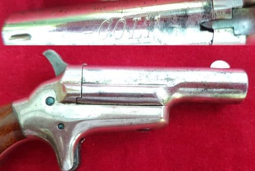 A scarce Colt no 3 nickel plated .41 rim-fire single-shot derringer. Circa 1875. Ref 1459.