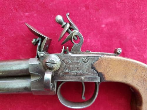 A scarce double Barrelled Tap Action Flintlock Pistol, made by BELLES & Co. circa 1800. Ref 2317.