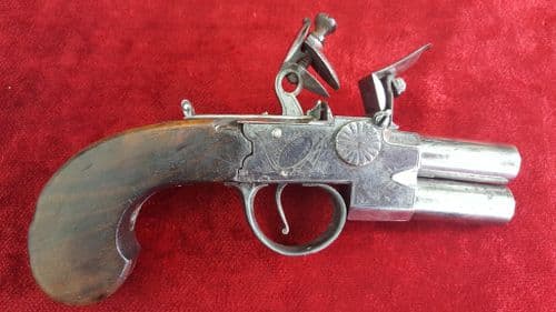 A scarce double Barrelled Tap Action Flintlock Pistol made by Henry Richards of london, circa 1808-1809. Ref 8878.