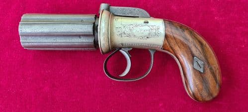 A scarce English .36  percussion bar-hammer pepper-box revolver by Powell. Circa 1840-1850. Ref 3986
