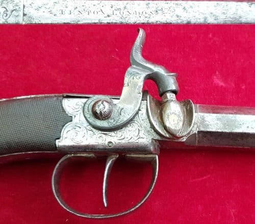A scarce  percussion Pistol with folding bayonet, made by Fenton of London. Circa 1840.  Ref 2807
