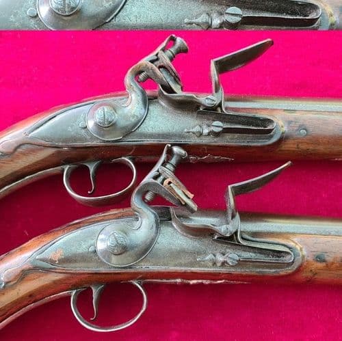 A superb pair of British silver mounted flintlock holster pistols by Barbar. Circa 1740. Ref 3756.