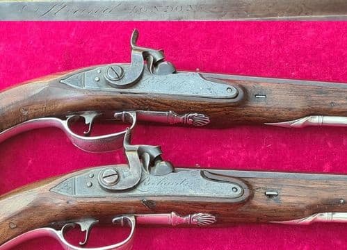 A superb pair of SCOTTISH MACPHERSON CLAN silver mounted holster pistols by RICHARDS London Ref 3929