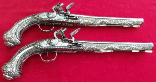 A SUPERB Pair of Silver Mounted Turkish Flintlock Pistols. Ref 1678.
