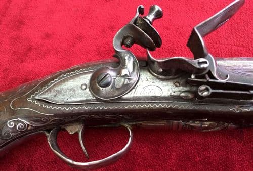 A very attractive Balkan area Flintlock pistol with heavy silver mounts, made around 1760-1790.  Good condition. Ref 7576.