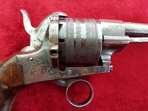 A very good continental Pin-fire 11mm 6 shot revolver with an unusual ring trigger and a five inch barrel. Ref 9796.