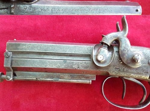 A very good example of a double barrel over/under percussion pistol by Charles Lancaster. Ref 1669.