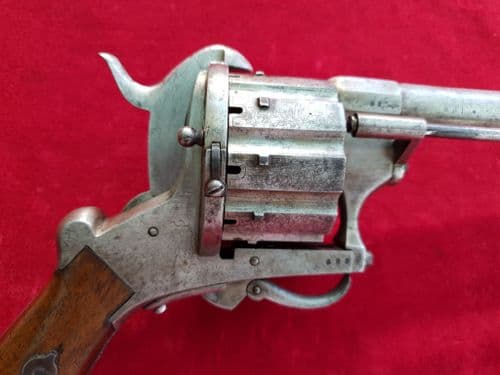 A very scarce 13mm calibre ten shot double action pin-fire revolver with folding trigger. Ref 1901.