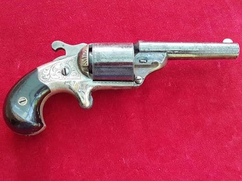 A Very Scarce American Moore's patent / front Loading Teat-Fire revolver. Ref 1589.