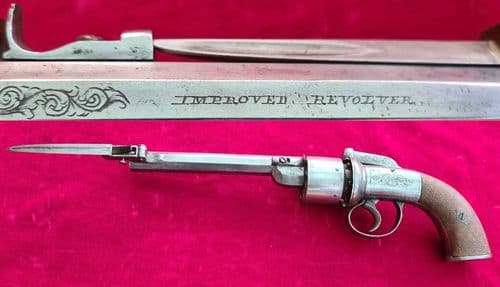 A very scarce high quality English transitional revolver fitted with a folding bayonet.   Ref 6428