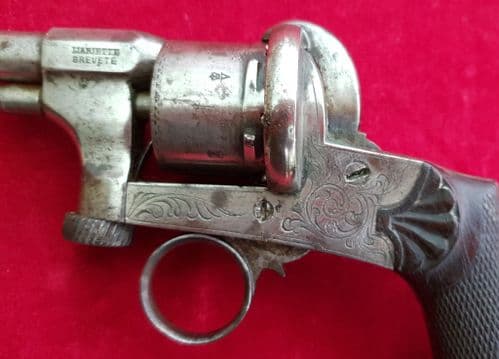 A very unusual 6 shot double action 7mm pin-fire revolver with a ring trigger. Good cond. Ref 2801