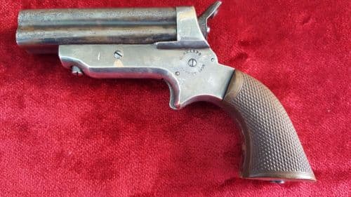 American 4 barrelled derringer marked on the frame "C. Sharp's Patent 1859". Ref 9070.