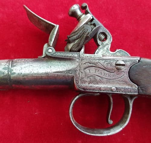 An English cannon barrelled flintlock pocket pistol engraved I Parkes. Circa 1770.  Ref 1262.