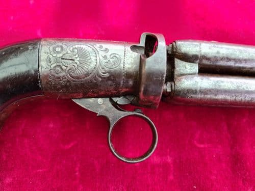 An under-hammer 4 barrel Mariette ring-trigger Percussion pepperbox revolver. C. 1840. Ref 7792.