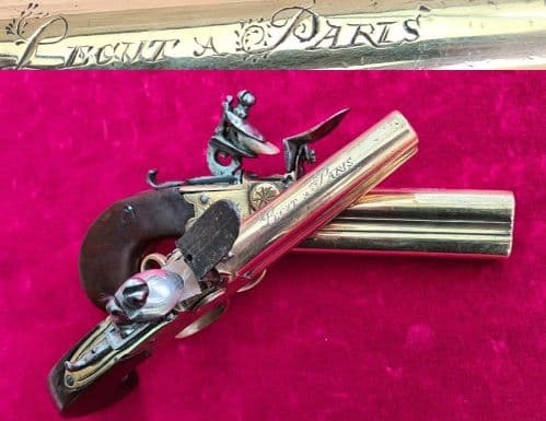 Pair of French over & Under double barrel brass tap action flintlock pistols. Circa 1780. Ref 3484