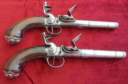 X X X SOLD X X  Pair of  Queen Anne  silver mounted flintlock pistols by Godsall, C. 1777. Ref 9533.