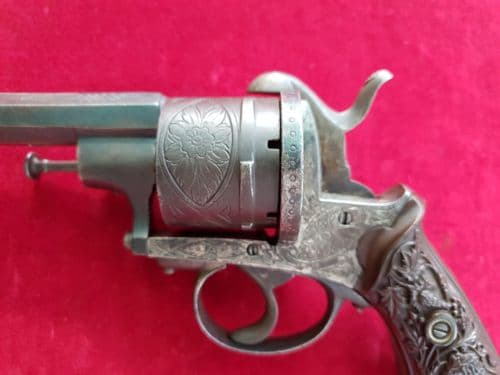 X X X  SOLD  X X X  6 shot double action  pin-fire revolver with embossed Lion grips. Ref 1608.