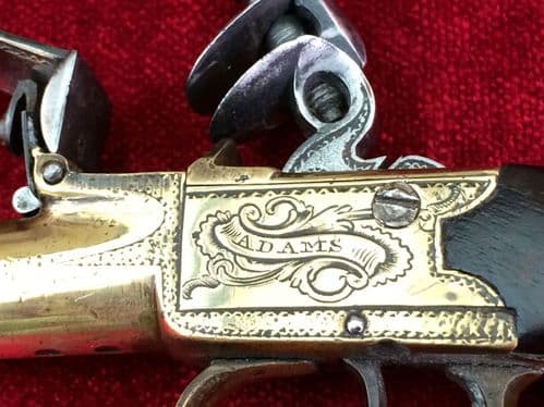 X X X SOLD  X X X A good silver mounted, all brass English Flintlock pocket pistol engraved "ADAMS". Very Good Condition. Ref 7807.