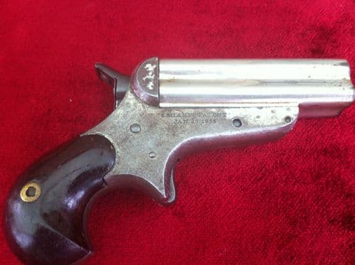 X X X  SOLD X X X  A Rare 4 brld Sharps rimfire Derringer, nickel plated, Bird's head grip. Obsolete antique calibre .32 Rimfire. Ref 6871