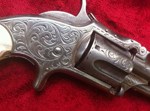 X X X  SOLD X X X  A Rare Engraved American Smith & Wesson Revolver circa 1870 .32 RIMFIRE. Ref 6012.