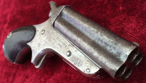 X X X  SOLD X X X A scarce Antique 4 barrelled Sharps American Gambler's Derringer,  Bird's head grip. Obsolete antique calibre .32 Rimfire. Ref 7597