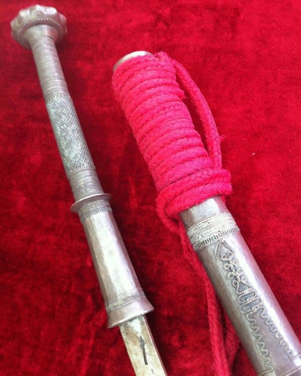 X X X   SOLD  X X X  A Silver Covered Burmese Dha sword. Complete with its original silver covered scabbard. Probably 19th Century. Ref 5560.