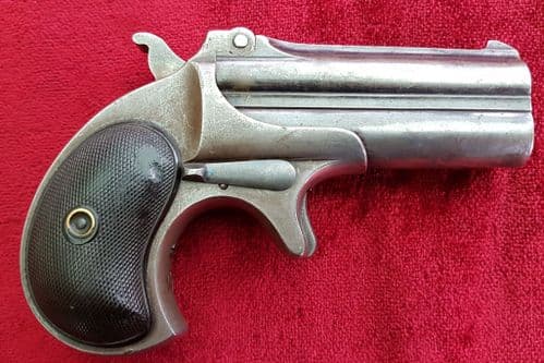 X X X SOLD X X  X An antique over & under Remington Double barrelled .41 cal rim-fire Derringer. Circa 1885. Good condition. Ref 9798.