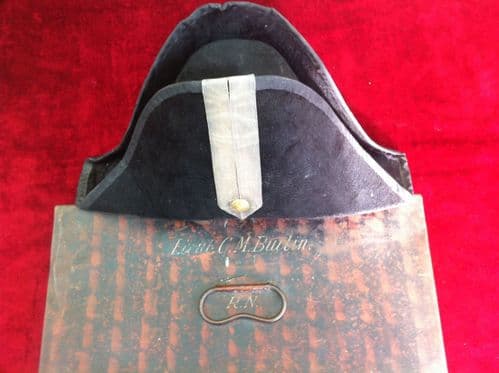 XXX SOLD XXX 19th century Medical Officers Bi-Corn hat. Complete in its correct carrying case with owners name Lieut. C. M. Butlin, R.N. Ref 7360.