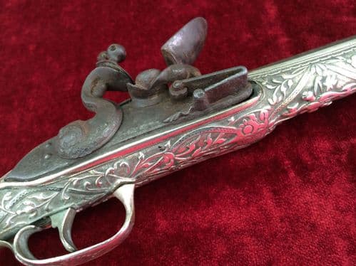 XXX SOLD XXX A very attractive silver mounted Balkan Flintlock pistol of good length, made around 1780-1800. Good Condition. Ref 7622
