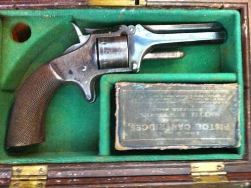 XXXX SOLD XXXX English .30 cal Antique Rimfire Revolver retailed in Halifax, Circa 1875, Excellent condition in its original wooden case. Ref 5862.