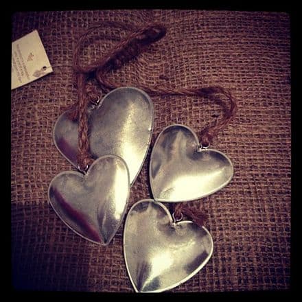 Four Hanging Tin Hearts
